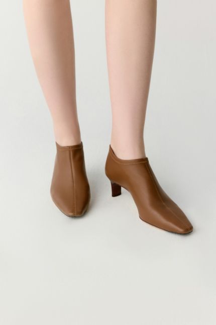 Bottines en cuir stretch